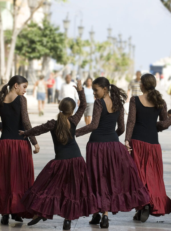 Girls/Women dancing on the street.